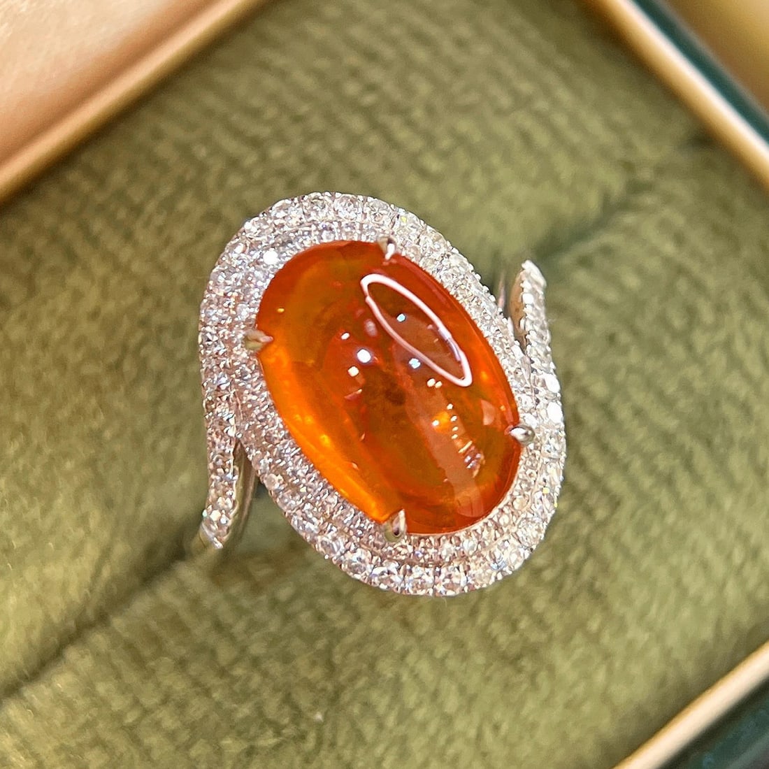 14k Gold 6.85 Ctw Natural Spessartine & Diamond Ring: Ref:231146070 // gold content:14k gold // ring size:7. 25us // // main gemstone:spessartine // shape:oval // carat weight:6. 33ct // color:orange // treatment:natural // // adjacent gemstone 2 :