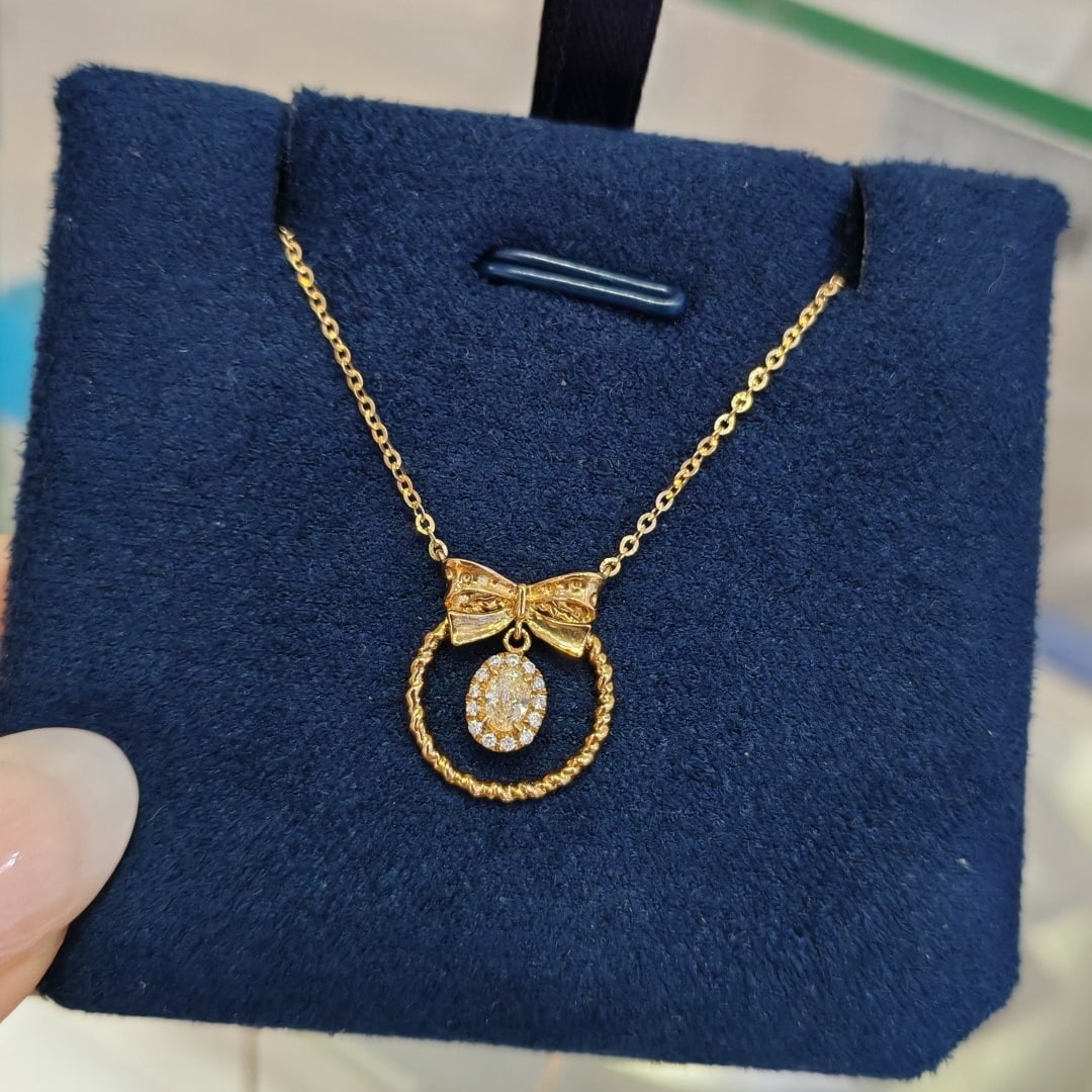 14k Gold 0.12 Ct Natural Yellow Diamond & Diamond Necklace: Ref:231146222 // gold content:14k gold // main gemstone:yellow diamond // shape:oval // carat weight:0. 12ct // color:yellow // treatment:natural // // adjacent gemstone 2 : diamond // shape:round //