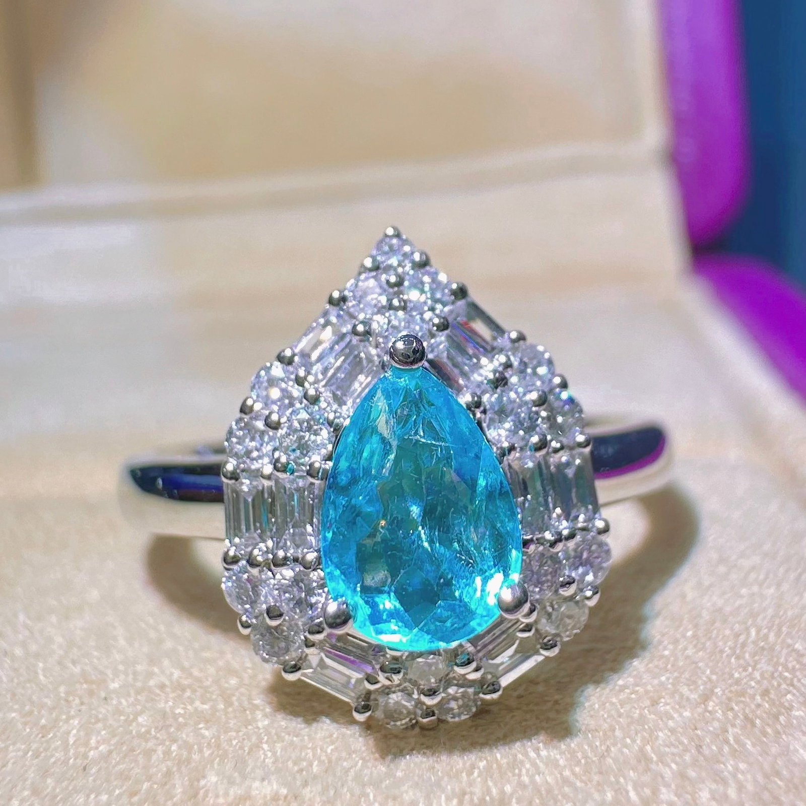 14k Gold 1.02 Ctw Natural Paraiba Tourmaline & Diamond Ring: Ref:231146229 // gold content:14k gold // ring size:7. 25us // // main gemstone:paraiba tourmaline // shape:pear // carat weight:0. 62ct // color:blue // treatment:natural // // adjacent gemstone 2 :