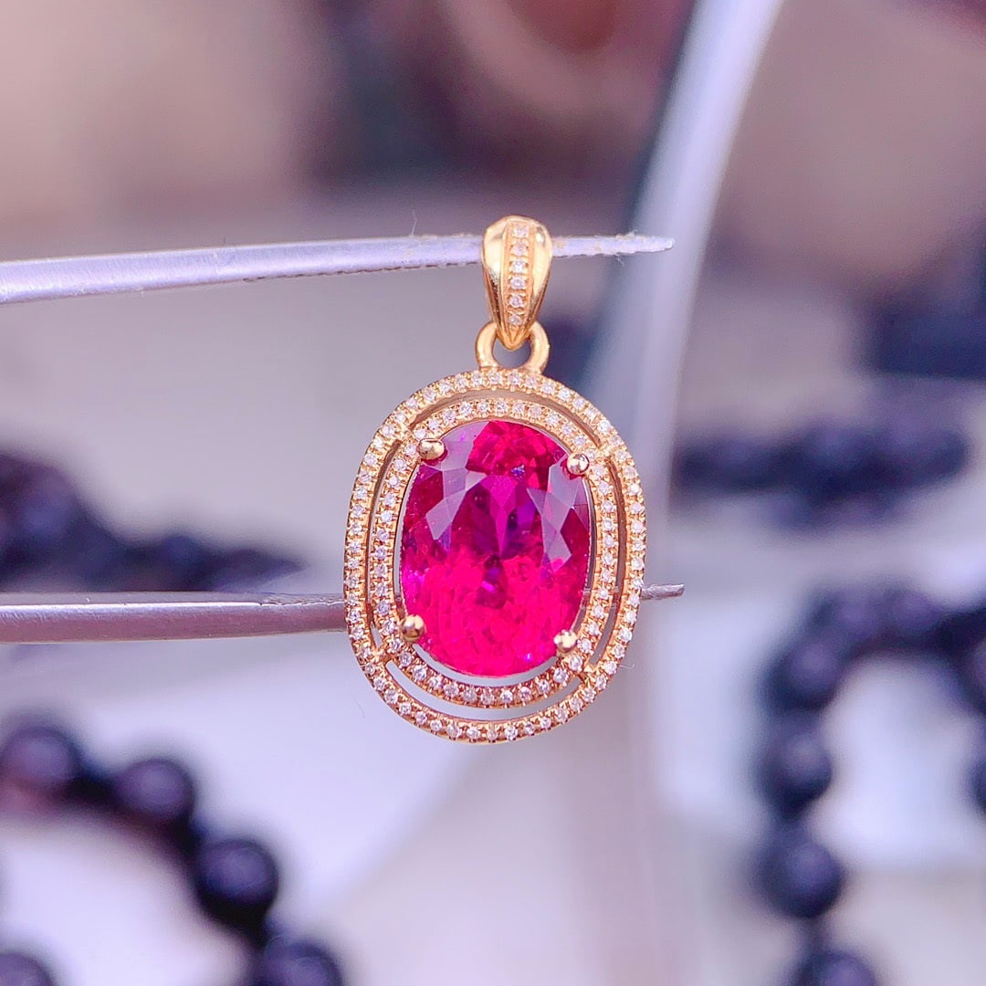 14k Gold 5 Ct Natural Tourmaline & Diamond Pendant( Without Chain ): Ref:231146324 // gold content:14k gold // main gemstone:tourmaline // shape:oval // carat weight:5ct // color:red // treatment:natural // // adjacent gemstone 2 : diamond // shape:round // clarity