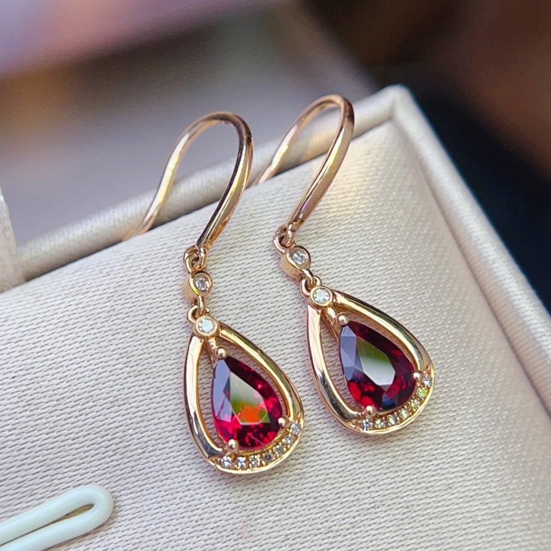 14k Gold 1.11 Ctw Natural Tourmaline & Diamond Earrings: Ref:231146365 // gold content:14k gold // main gemstone:tourmaline // shape:pear // carat weight:1. 05ct // color:red // treatment:natural // // adjacent gemstone 2 : diamond // number of stones:18