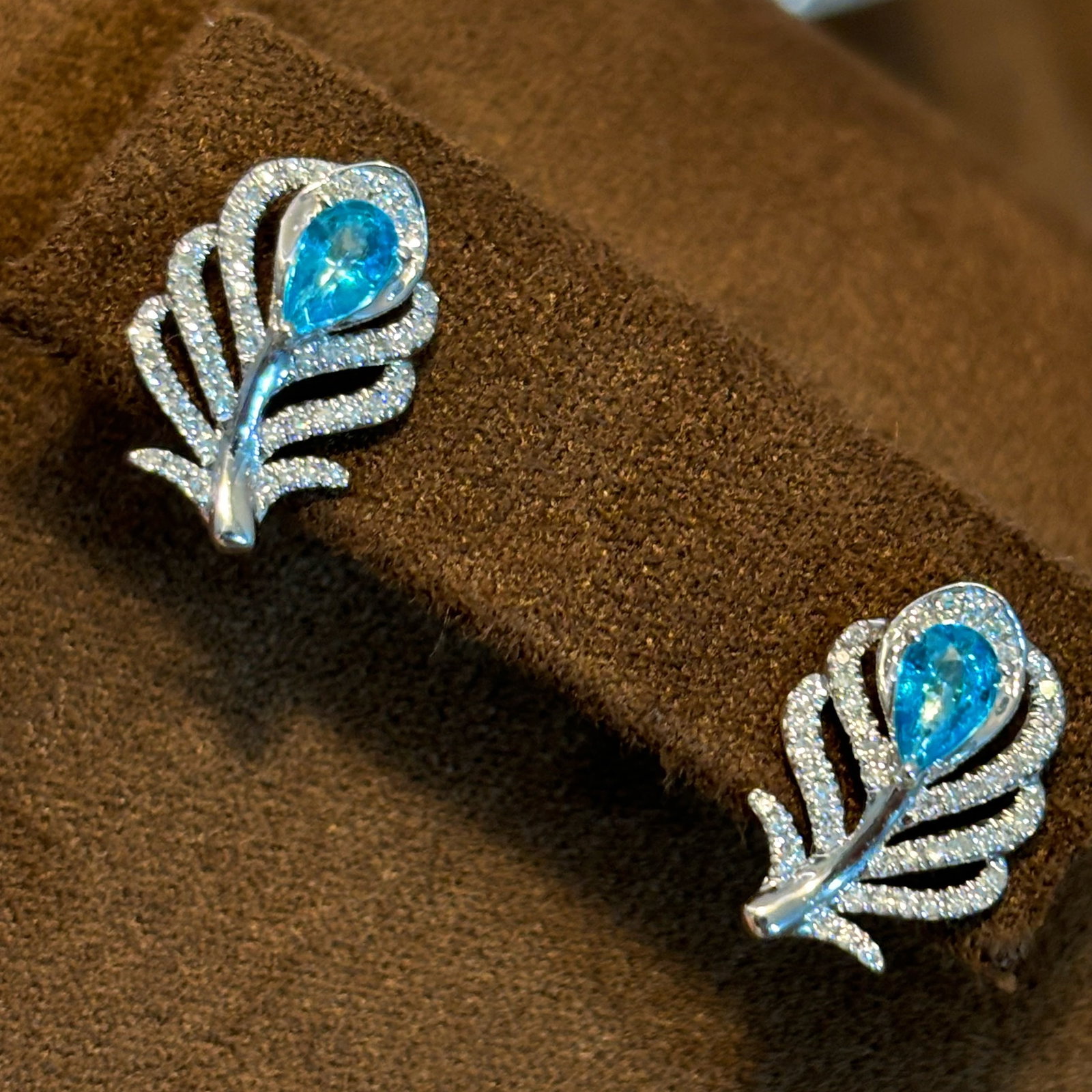 14k Gold 0.35 Ct Natural Paraiba Tourmaline & Diamond Earrings: Ref:231146408 // gold content:14k gold // main gemstone:paraiba tourmaline // shape:pear // carat weight:0. 35ct // color:blue // treatment:natural // // adjacent gemstone 2 : diamond //