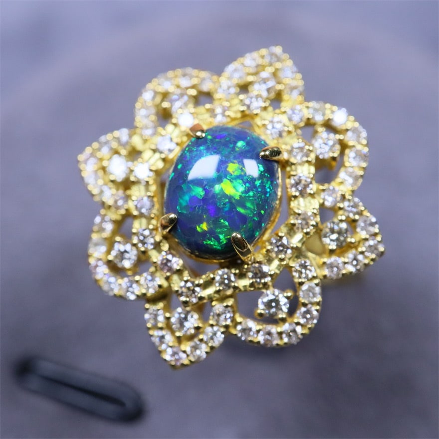 14k Gold 1.7 Ctw Natural Opal & Diamond Ring: Ref:230974344 // gold content:14k gold // ring size:7. 25us // // main gemstone:opal // shape:oval // carat weight:1ct // color:color // treatment:natural // // adjacent gemstone 2 : diamond //