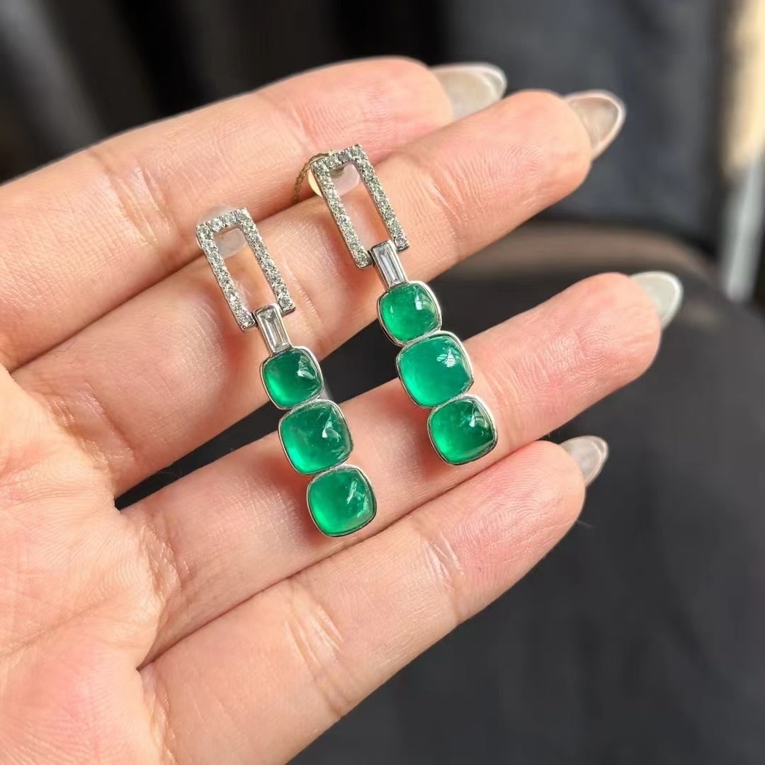 14k Gold 6.2 Ct Natural Emerald & Diamond Earrings: Ref:230971063 // gold content:14k gold // main gemstone:emerald // shape:suger-loaf // carat weight:6. 2ct // color:green // treatment:natural // // adjacent gemstone 2 : diamond // number of stones:3