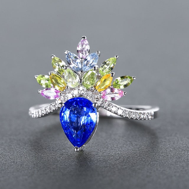 14k Gold 1.24 Ctw Vivid Blue Natural Sapphire & Diamond Ring: Ref:230976094 // gold content:14k gold // ring size:7. 25us // // main gemstone:sapphire // shape:pear // carat weight:1. 16ct // color:vivid blue // treatment:natural // // adjacent gemstone 2 :