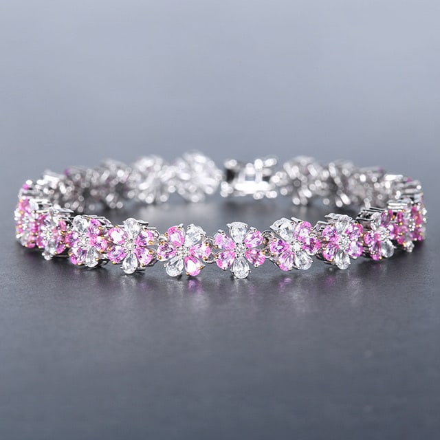 14k Gold 10.05 Ctw Natural Sapphire & Sapphire Bracelet: Ref:230976099 // gold content:14k gold // main gemstone:sapphire // shape:pear // carat weight:6. 6ct // color:pink // treatment:natural // // adjacent gemstone 2 : sapphire // shape:pear // carat wei
