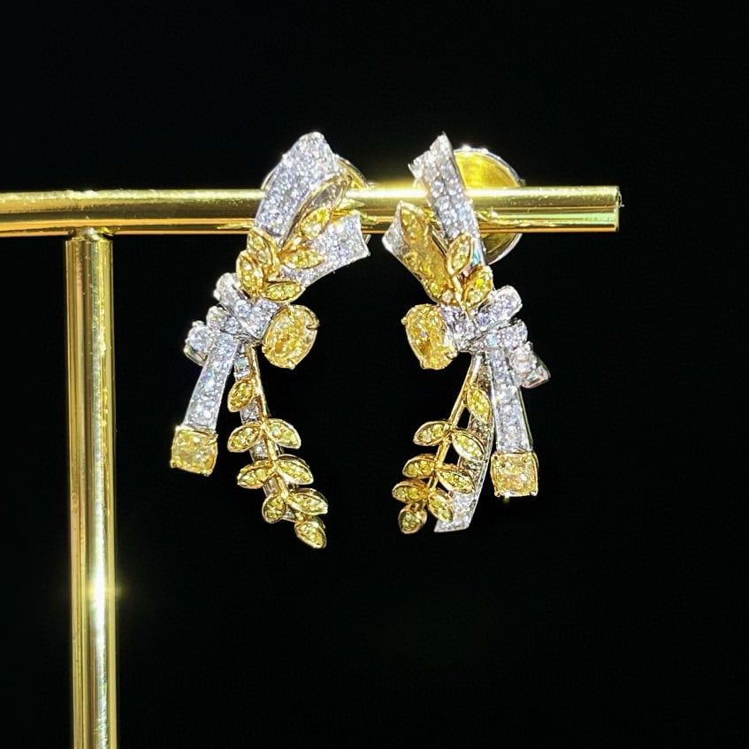 14k Gold 1.07 Ctw Natural Yellow Diamond & Diamond Earrings: Ref:230981030 / / gold content:14k gold / / main gemstone:yellow diamond / / shape:multiply / / carat weight:0. 53ct / / color:yellow / / treatment:natural / / / / adjacent gemstone 2 : diamond / /
