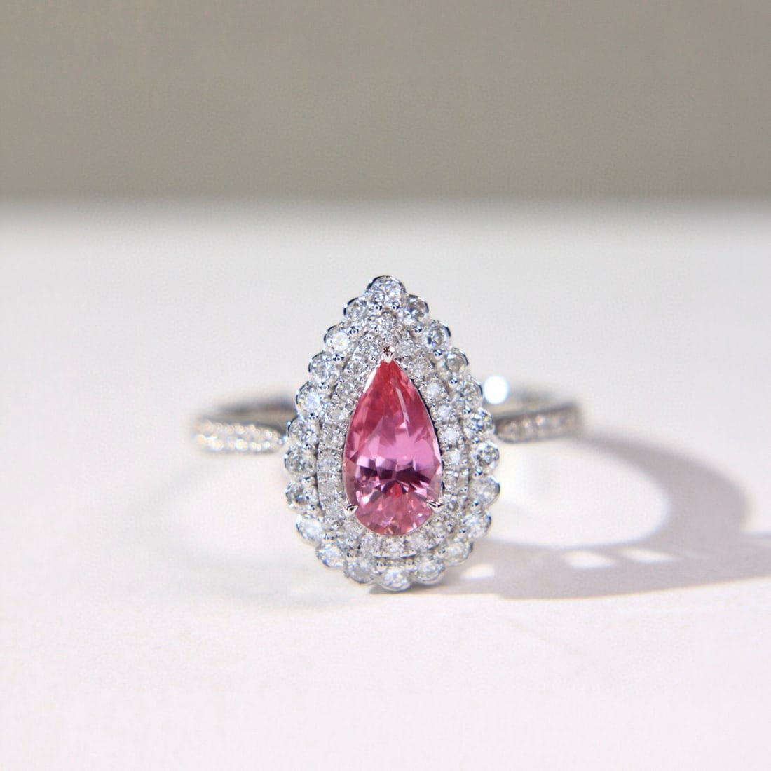 14k Gold 1.49 Ctw Natural Padparadscha Sapphire & Diamond Ring: Ref:230981032 / / gold content:14k gold / / ring size:7. 25us / / / / main gemstone:padparadscha sapphire / / shape:pear / / carat weight:1. 03ct / / color:orangish pink / / treatment:natural / / / /