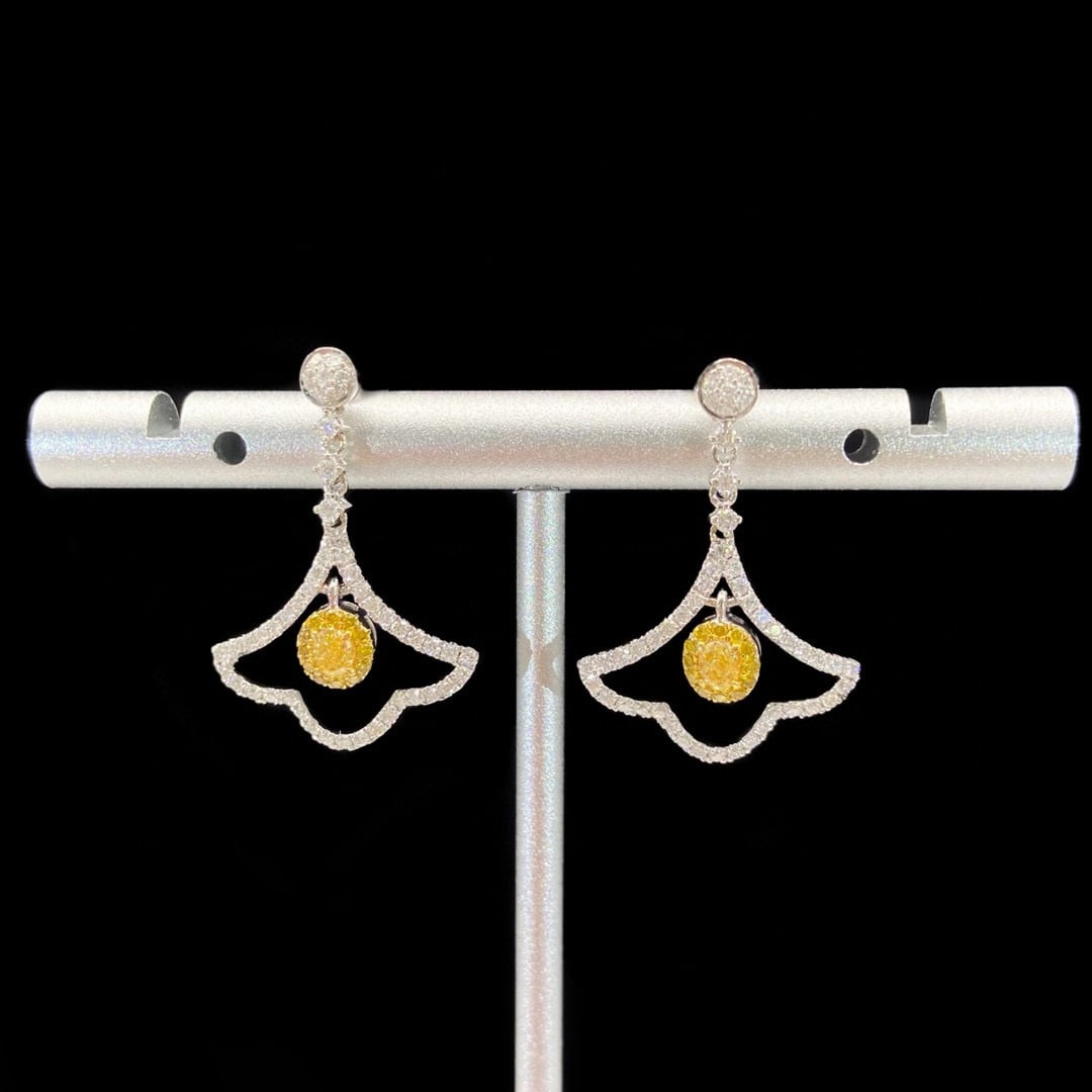 14k Gold 0.74 Ctw Natural Yellow Diamond & Diamond Earrings: Ref:230981166 / / gold content:14k gold / / main gemstone:yellow diamond / / shape:oval / / carat weight:0. 21ct / / color:yellow / / treatment:natural / / / / adjacent gemstone 2 : diamond / /