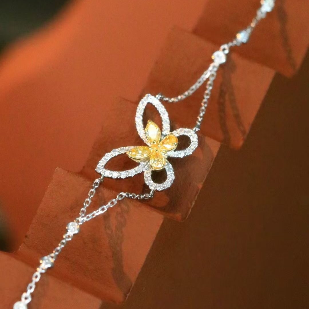 14k Gold 0.75 Ct Natural Color Diamond & Butterfly Bracelet: Ref:230982036 / / gold content:14k gold / / main gemstone:diamond / / shape:multiply / / carat weight:0. 75ct / / clarity grade:vs-si / / color:color / / treatment:natural / / High Estimate: 3300
