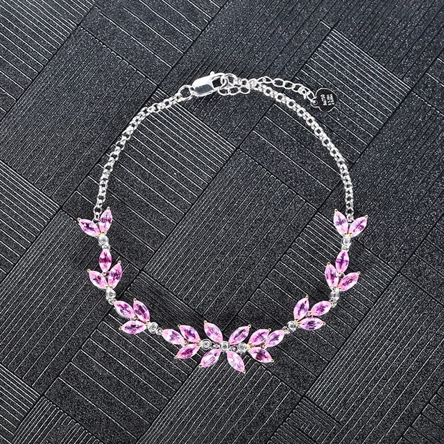 14k Gold 5.19 Ctw Natural Padparadscha Sapphire & Diamond Bracelet: Ref:230982044 / / gold content:14k gold / / main gemstone:padparadscha sapphire / / shape:marquise / / carat weight:5. 1ct / / color:orangish pink / / treatment:natural / / / / adjacent gemstone 2 :