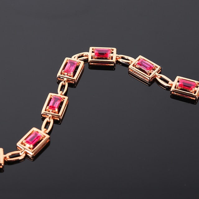 14k Gold 3.35 Ct Natural Ruby Bracelet: Ref:230982088 / / gold content:14k gold / / main gemstone:ruby / / shape:rectangle / / carat weight:3. 35ct / / color:red / / treatment:natural / / Low Estimate: 4800 Condition: New High Estimate: