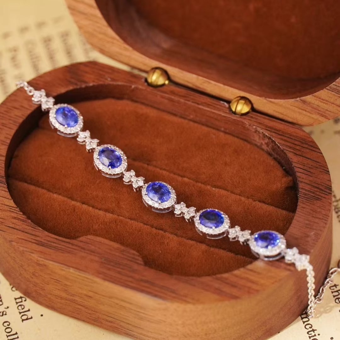 14k Gold 2.85 Ct Natural Sapphire & Diamond Bracelet: Ref:230982106 / / gold content:14k gold / / main gemstone:sapphire / / shape:oval / / carat weight:2. 85ct / / color:blue / / treatment:natural / / / / adjacent gemstone 2 : diamond / / shape:round /