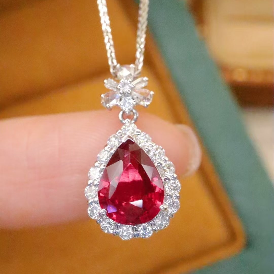 14k Gold 1.99 Ctw Natural Ruby & Diamond Pendant( Without Chain ): Ref:230982123 / / gold content:14k gold / / main gemstone:ruby / / shape:pear / / carat weight:1. 58ct / / color:pigeonblood red / / treatment:natural / / / / adjacent gemstone 2 : diamond / /