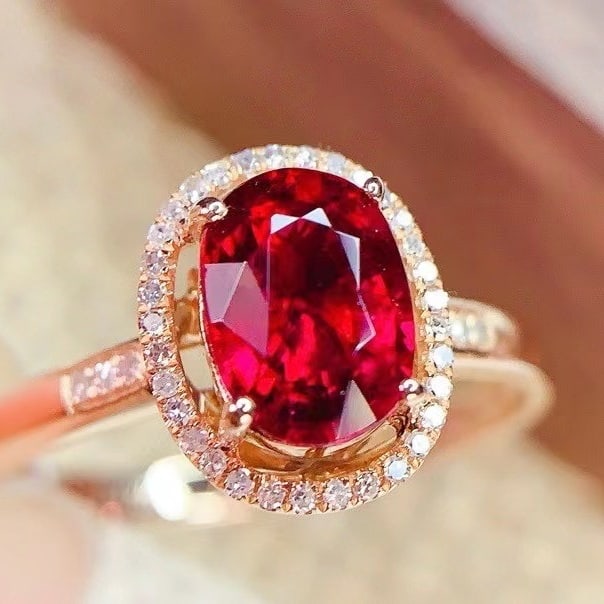 14k Gold 1.7 Ct Natural Tourmaline & Diamond Ring: Ref:230982139 / / gold content:14k gold / / ring size:7. 25us / / / / main gemstone:tourmaline / / shape:oval / / carat weight:1. 7ct / / color:red / / treatment:natural / / / / adjacent gemstone 2 :