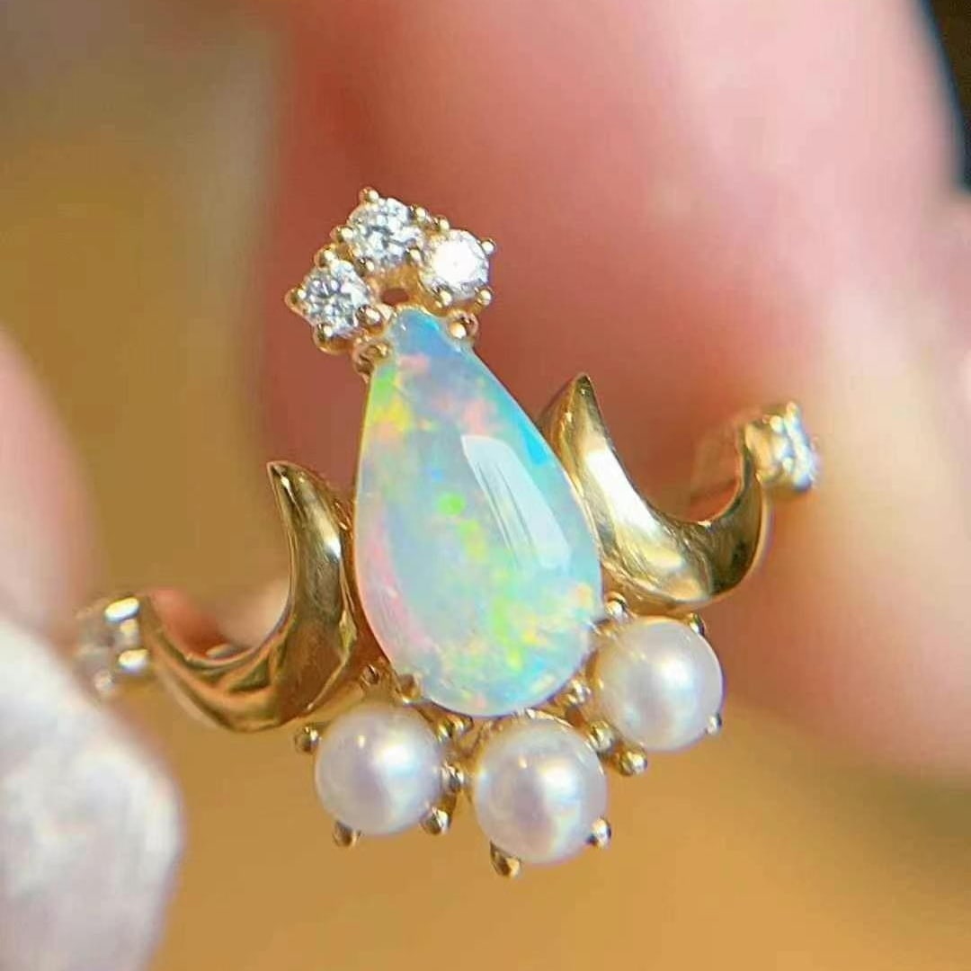 14k Gold 0.51 Ctw Natural Opal & Diamond Ring: Ref:230982160 / / gold content:14k gold / / ring size:7. 25us / / / / main gemstone:opal / / shape:pear / / carat weight:0. 43ct / / color:color / / treatment:natural / / / / adjacent gemstone 2 :