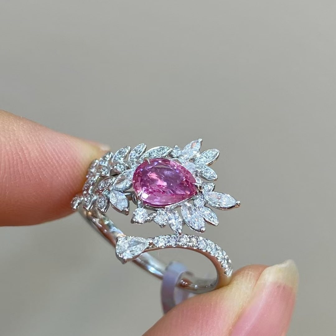14k Gold 1.67 Ctw Natural Padparadscha Sapphire & Diamond Ring: Ref:230982196 / / gold content:14k gold / / ring size:7. 25us / / / / main gemstone:padparadscha sapphire / / shape:pear / / carat weight:1. 06ct / / color:orangish pink / / treatment:natural / / / /