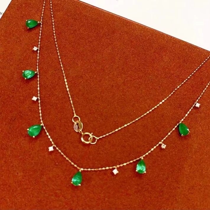 14k Gold 2.15 Ct Natural Emerald & Sapphire Necklace: Ref:230982199 / / gold content:14k gold / / main gemstone:emerald / / shape:pear / / carat weight:2. 15ct / / color:green / / treatment:natural / / / / adjacent gemstone 2 : sapphire / / number of