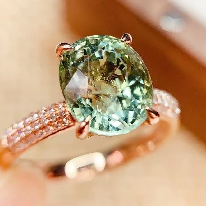 14k Gold 3.6 Ct Natural Tourmaline & Diamond Ring: Ref:230982223 / / gold content:14k gold / / ring size:7. 25us / / / / main gemstone:tourmaline / / shape:oval / / carat weight:3. 6ct / / color:green / / treatment:natural / / / / adjacent gemstone 2