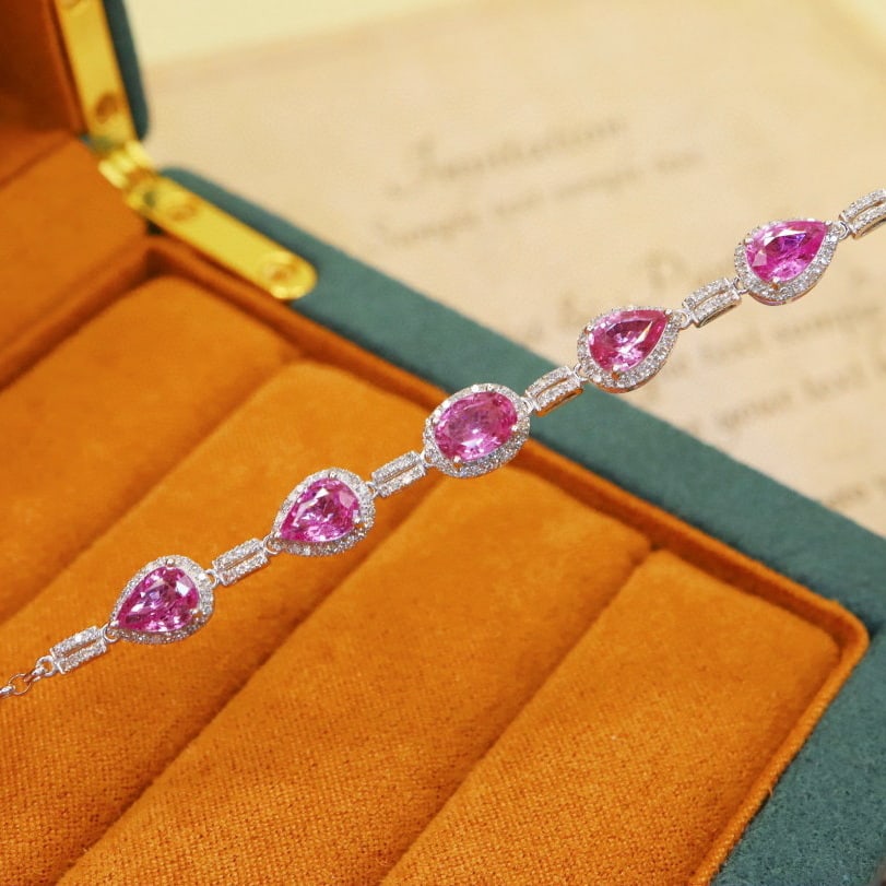 14k Gold 4.45 Ctw Natural Padparadscha Sapphire & Diamond Bracelet: Ref:230982253 / / gold content:14k gold / / main gemstone:padparadscha sapphire / / shape:multiply / / carat weight:3. 96ct / / color:orangish pink / / treatment:natural / / / / adjacent gemstone 2 :