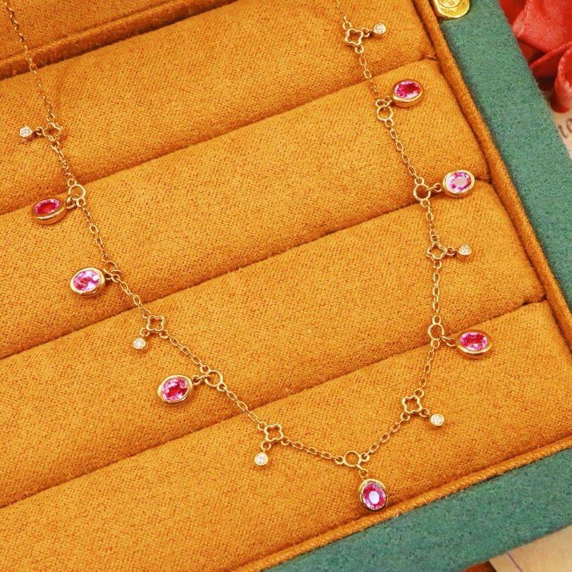 14k Gold 1.94 Ctw Natural Padparadscha Sapphire & Diamond Necklace: Ref:230982254 / / gold content:14k gold / / main gemstone:padparadscha sapphire / / shape:oval / / carat weight:1. 88ct / / color:orangish pink / / treatment:natural / / / / adjacent gemstone 2 :