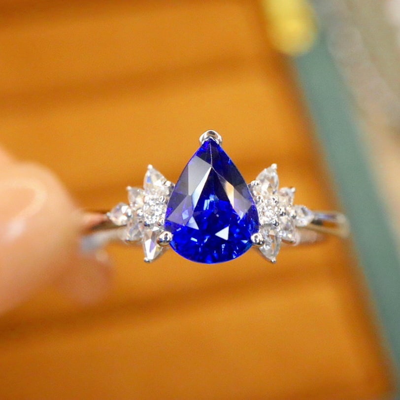 14k Gold 1.34 Ctw Natural Sapphire & Diamond Ring: Ref:230982272 / / gold content:14k gold / / ring size:7. 25us / / / / main gemstone:sapphire / / shape:pear / / carat weight:1. 22ct / / color:royal blue / / treatment:natural / / / / adjacent