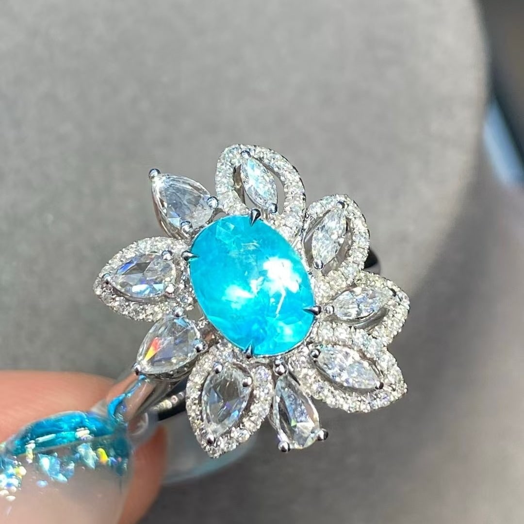 14k Gold 1.96 Ctw Natural Paraiba Tourmaline & Diamond Ring: Ref:230982297 / / gold content:14k gold / / ring size:7. 25us / / / / main gemstone:paraiba tourmaline / / shape:oval / / carat weight:1. 17ct / / color:blue / / treatment:natural / / / / adjacent