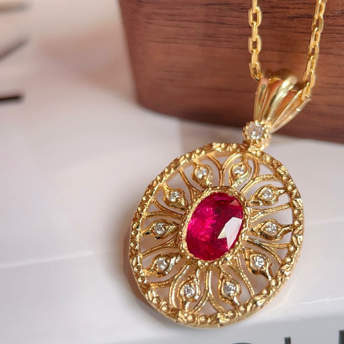 14k Gold 0.80 Ctw Natural Ruby & Diamond Pendant( Without Chain ): Ref:230982320 / / gold content:14k gold / / main gemstone:ruby / / shape:oval / / carat weight:0. 73ct / / color:red / / treatment:natural / / / / adjacent gemstone 2 : diamond / / shape:round / /