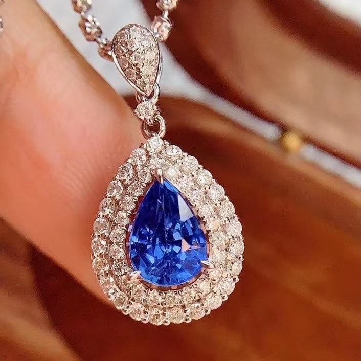 14k Gold 1.45 Ct Natural Sapphire & Diamond Pendant( Without Chain ): Ref:230982366 / / gold content:14k gold / / main gemstone:sapphire / / shape:pear / / carat weight:1. 45ct / / color:blue / / treatment:natural / / / / adjacent gemstone 2 : diamond / / number of