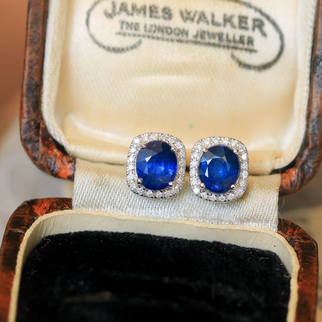 14k Gold 2.22 Ctw Natural Sapphire & Diamond Earrings: Ref:230982384 / / gold content:14k gold / / main gemstone:sapphire / / shape:oval / / carat weight:2. 06ct / / color:blue / / treatment:natural / / / / adjacent gemstone 2 : diamond / / shape:round /