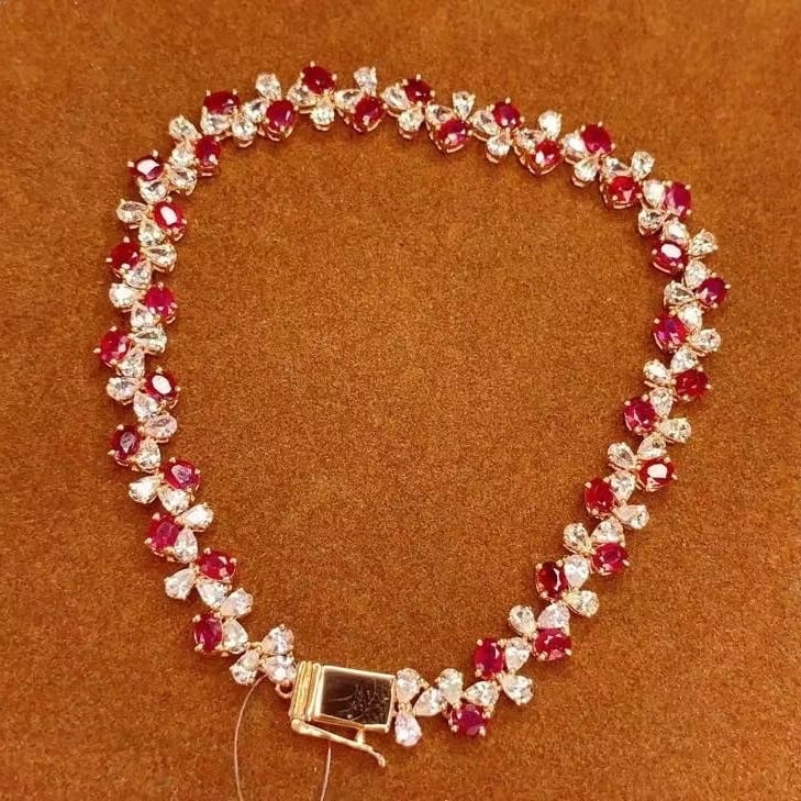14k Gold 5.68 Ct Natural Ruby & Sapphire Bracelet: Ref:230982398 / / gold content:14k gold / / main gemstone:ruby / / shape:oval / / carat weight:5. 68ct / / color:red / / treatment:natural / / / / adjacent gemstone 2 : sapphire / / number of stones:7
