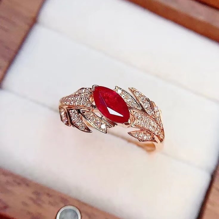 14k Gold 0.85 Ct Natural Ruby & Diamond Ring: Ref:230982400 / / gold content:14k gold / / ring size:7. 25us / / / / main gemstone:ruby / / shape:marquise / / carat weight:0. 85ct / / color:red / / treatment:natural / / / / adjacent gemstone 2 :