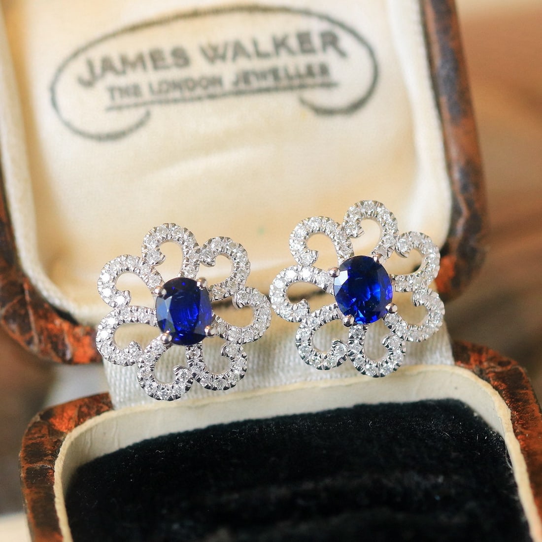 14k Gold 1.29 Ctw Natural Sapphire & Diamond Earrings: Ref:230982418 / / gold content:14k gold / / main gemstone:sapphire / / shape:oval / / carat weight:0. 8ct / / color:royal blue / / treatment:natural / / / / adjacent gemstone 2 : diamond / /