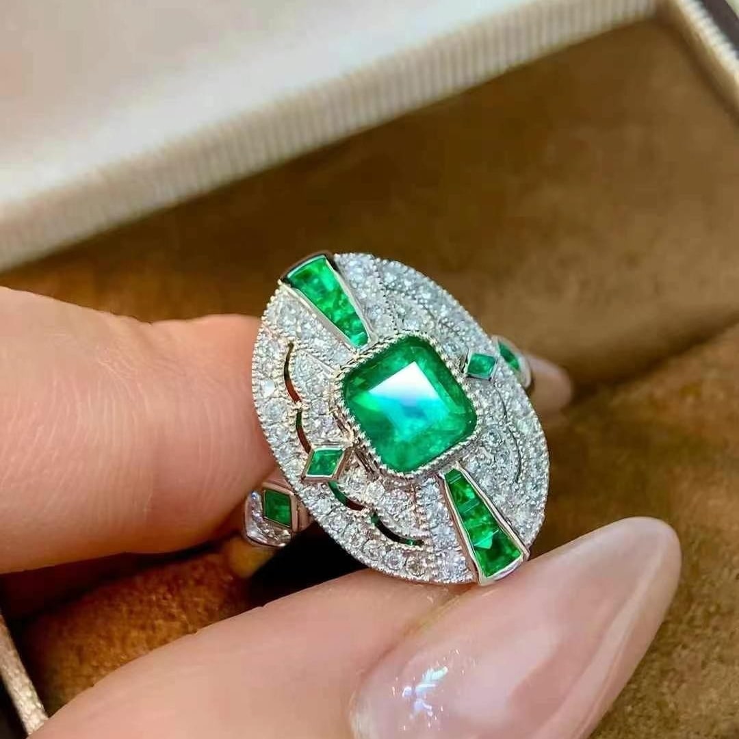 14k Gold 1.15 Ctw Vivid Green Natural Emerald & Diamond Ring: Ref:230982426 / / gold content:14k gold / / ring size:7. 25us / / / / main gemstone:emerald / / shape:octagonal / / carat weight:0. 80ct / / color:vivid green / / treatment:natural / / / / adjacent