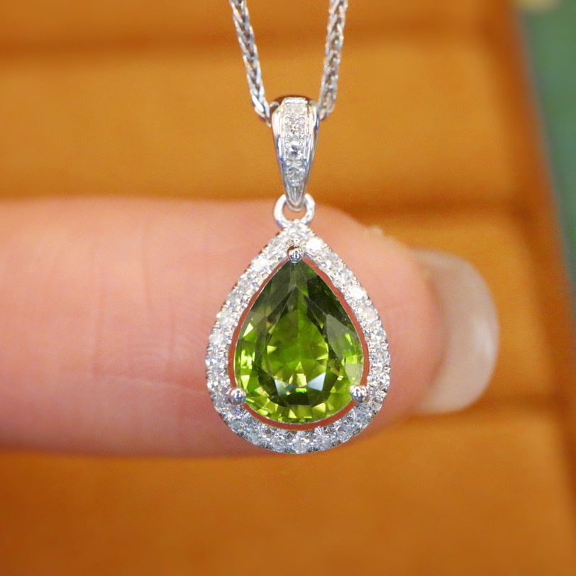 14k Gold 1.57 Ctw Natural Sapphire & Diamond Pendant( Without Chain ): Ref:230982443 / / gold content:14k gold / / main gemstone:sapphire / / shape:pear / / carat weight:1. 42ct / / color:green / / treatment:natural / / / / adjacent gemstone 2 : diamond / / number of