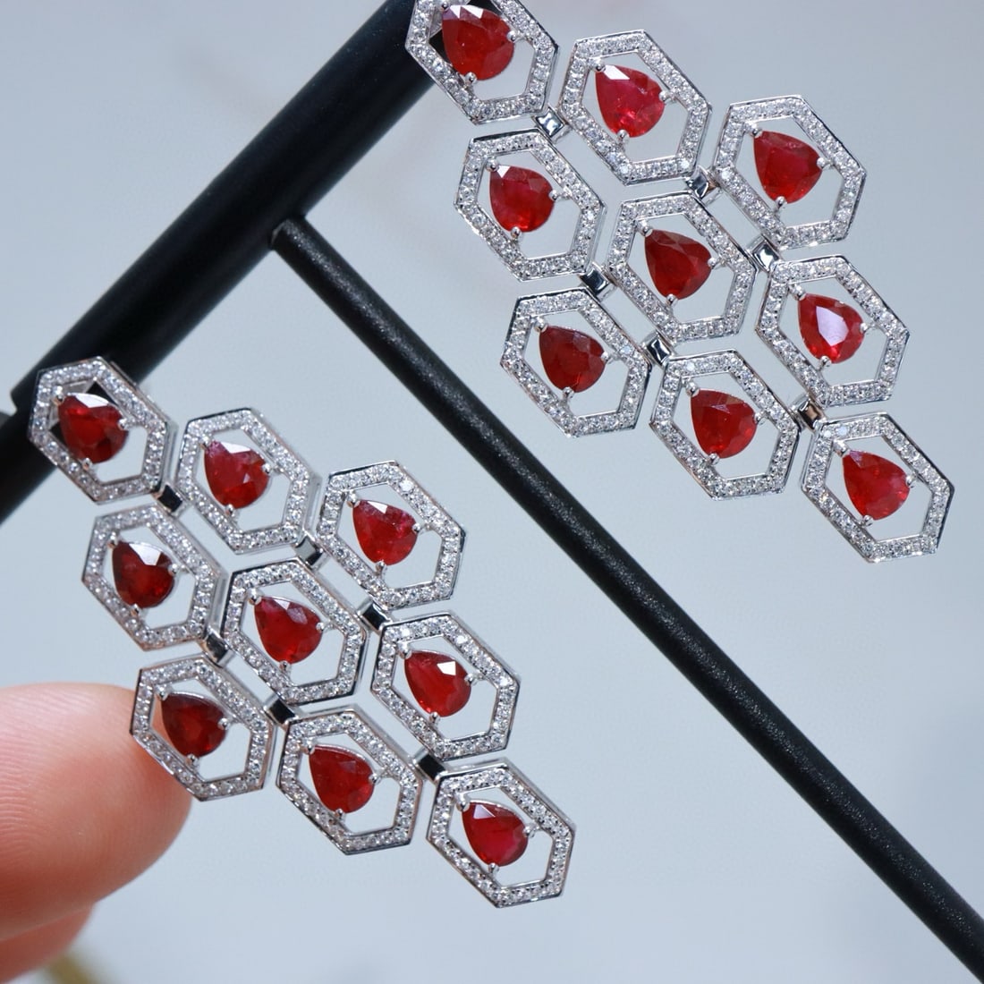 14k Gold 7.97 Ctw Natural Ruby & Lab Grown Diamond Earrings: Ref:230979010 // gold content:14k gold // main gemstone:ruby // shape:pear // carat weight:6. 57ct // color:red // treatment:natural // // adjacent gemstone 2 : lab grown diamond // shape:round // car