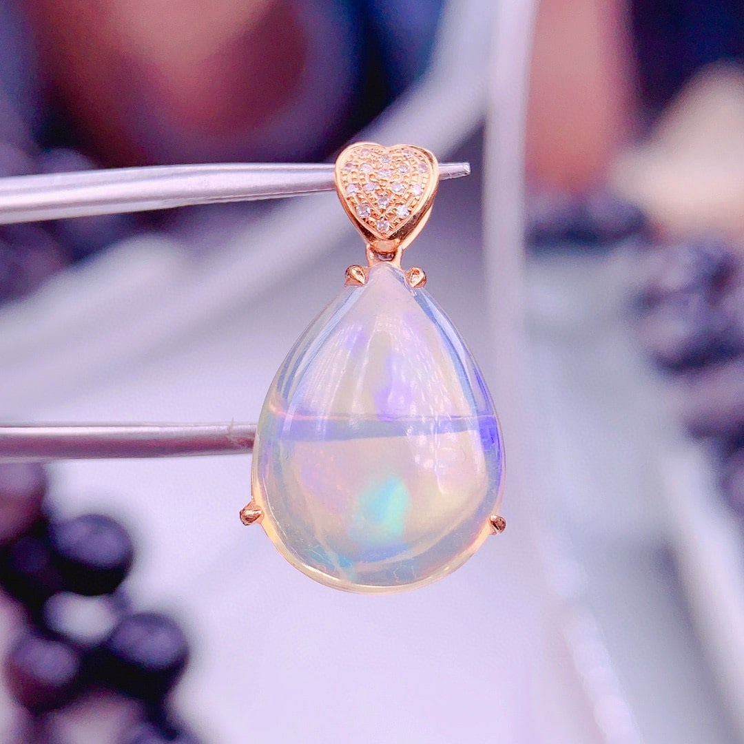 14k Gold 6.5 Ct Natural Opal & Diamond Pendant( Without Chain ): Ref:230979015 // gold content:14k gold // main gemstone:opal // shape:pear // carat weight:6. 5ct // color:white // treatment:natural // // adjacent gemstone 2 : diamond // shape:round // clarity