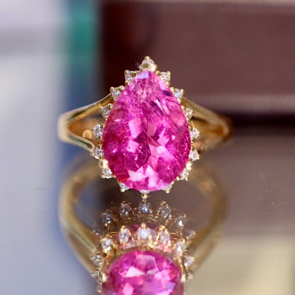 14k Gold 2.87 Ctw Natural Tourmaline & Diamond Ring: Ref:230979021 // gold content:14k gold // ring size:7. 25us // // main gemstone:tourmaline // shape:pear // carat weight:2. 8ct // color:pink // treatment:natural // // adjacent gemstone 2 : diamond