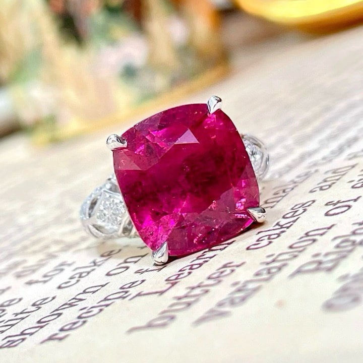14k Gold 10.54 Ctw Natural Tourmaline & Diamond Ring: Ref:230979041 // gold content:14k gold // ring size:7. 25us // // main gemstone:tourmaline // shape:cushion // carat weight:10. 11ct // color:purplish pink // treatment:natural // // adjacent