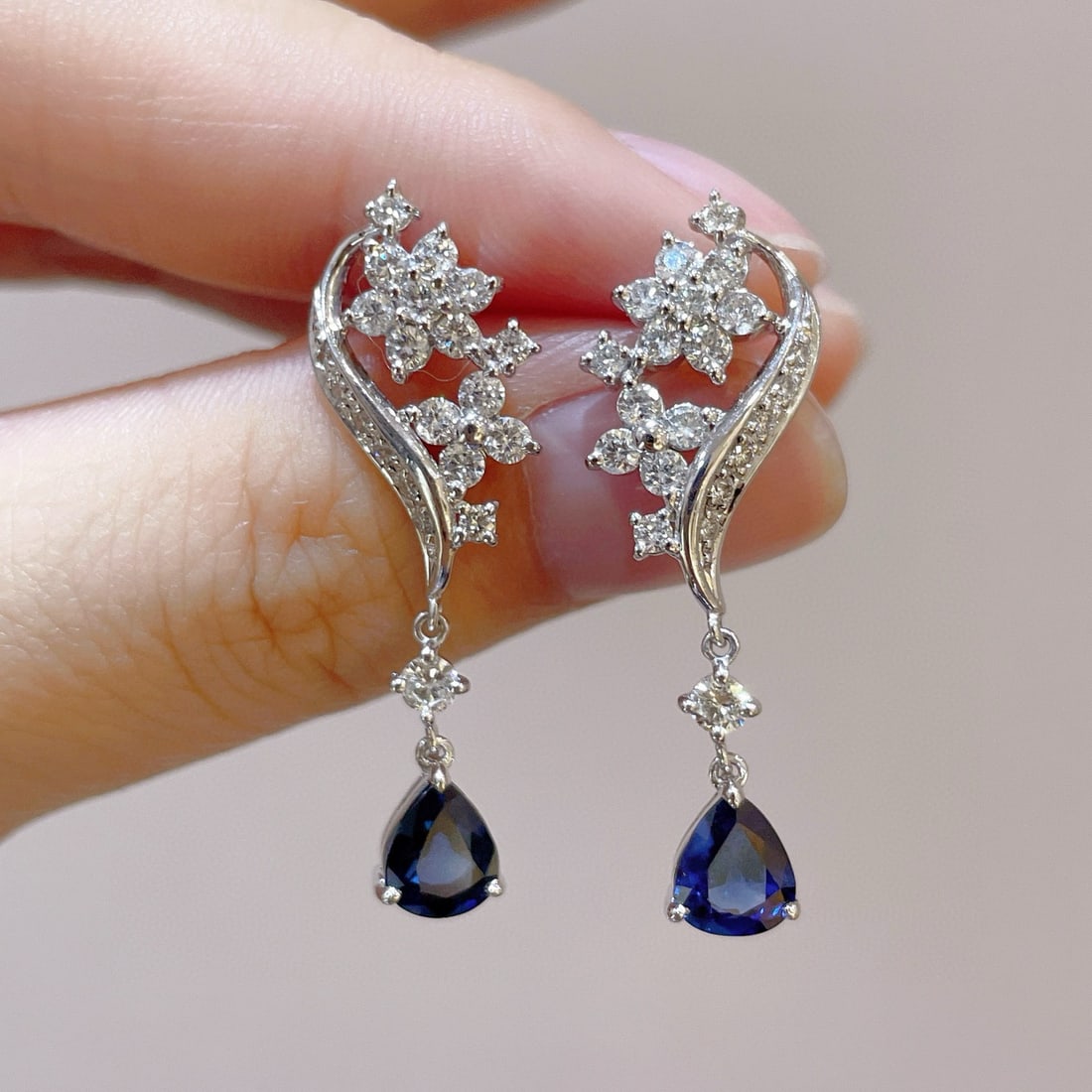 14k Gold 3.09 Ctw Natural Sapphire & Diamond Earrings: Ref:230979051 // gold content:14k gold // main gemstone:sapphire // shape:pear // carat weight:1. 95ct // color:blue // treatment:natural // // adjacent gemstone 2 : diamond // shape:round // carat