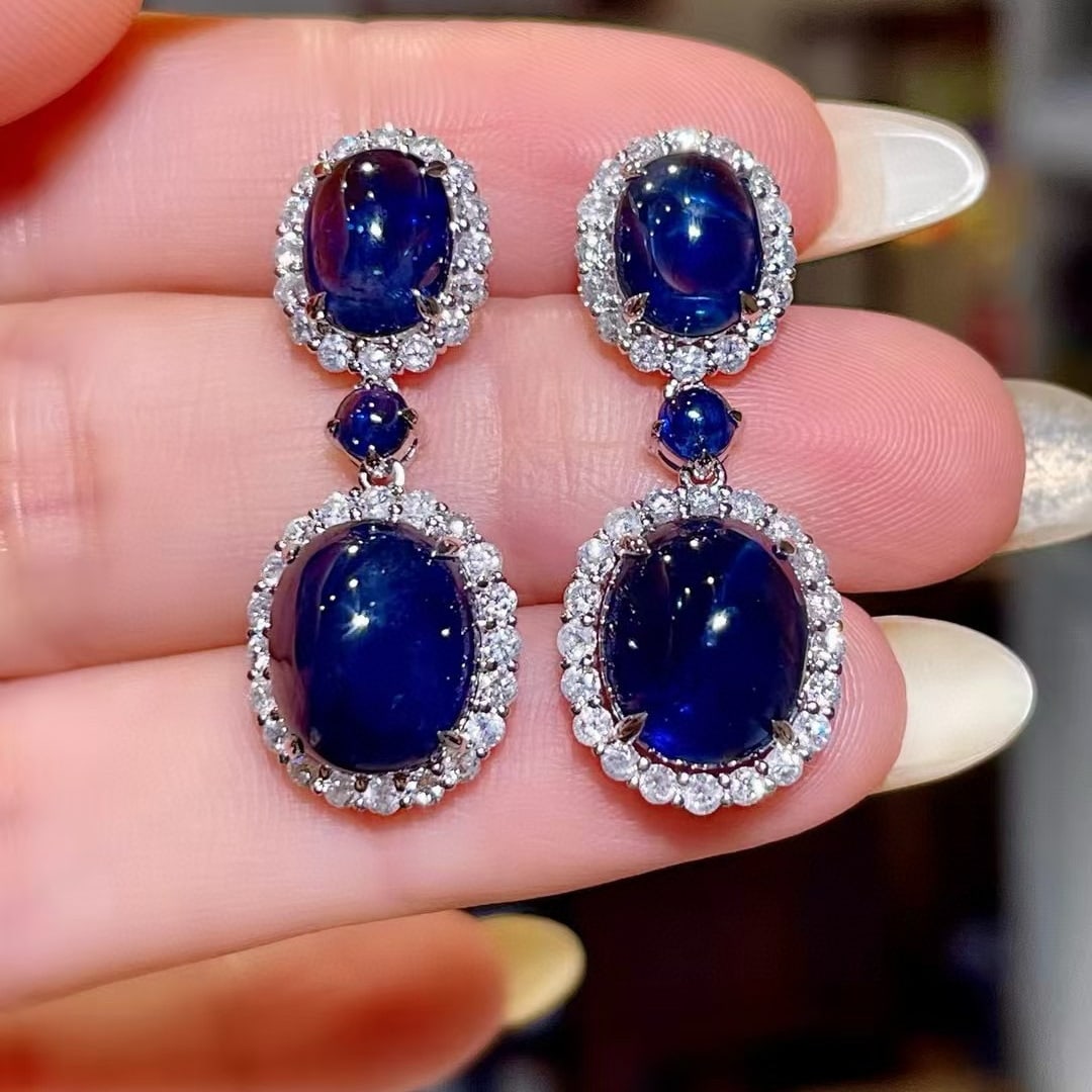 14k Gold 17.07 Ctw Natural Sapphire & Diamond Earrings: Ref:230979128 // gold content:14k gold // main gemstone:sapphire // shape:oval // carat weight:15. 63ct // color:blue // treatment:natural // cut grade:g // // adjacent gemstone 2 : diamond // shape:r