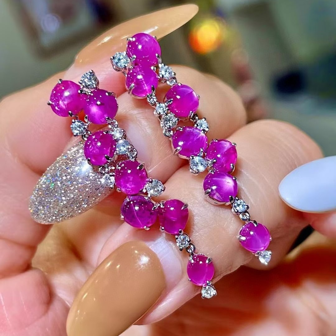 14k Gold 10.83 Ctw Natural Star Ruby & Diamond Earrings: Ref:230979129 // gold content:14k gold // main gemstone:star ruby // shape:oval // carat weight:10. 26ct // color:red // treatment:natural // cut grade:g // // adjacent gemstone 2 : diamond // shape:r