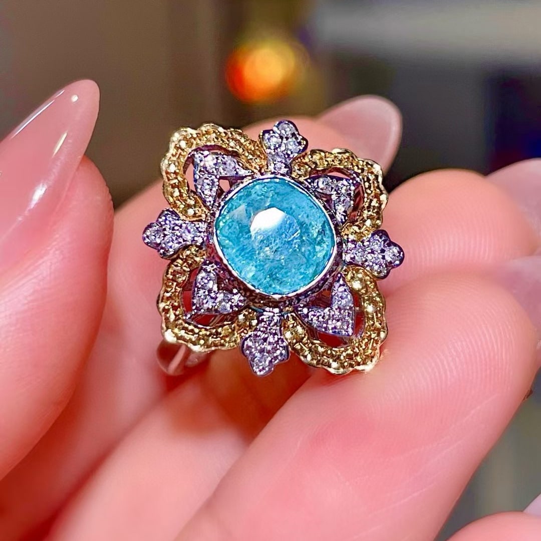 14k Gold 1.65 Ctw Natural Paraiba Tourmaline & Diamond Ring: Ref:230979131 // gold content:14k gold // ring size:7. 25us // // main gemstone:paraiba tourmaline // shape:oval // carat weight:1. 50ct // color:blue // treatment:natural // cut grade:g // //