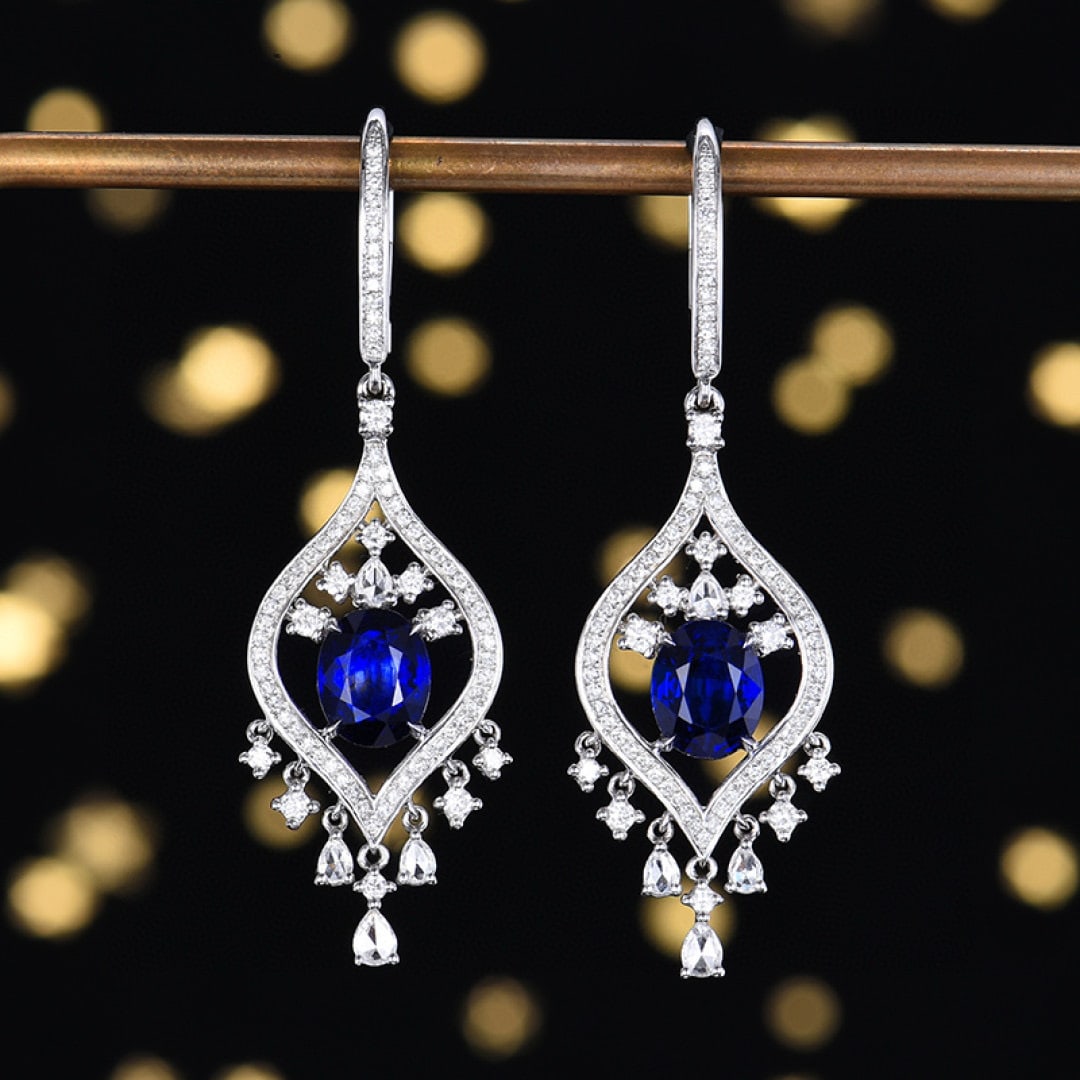 14k Gold 4.22 Ctw Natural Sapphire & Diamond Earrings: Ref:230979149 // gold content:14k gold // main gemstone:sapphire // shape:oval // carat weight:3. 30ct // color:blue // treatment:natural // cut grade:g // // adjacent gemstone 2 : diamond // number o