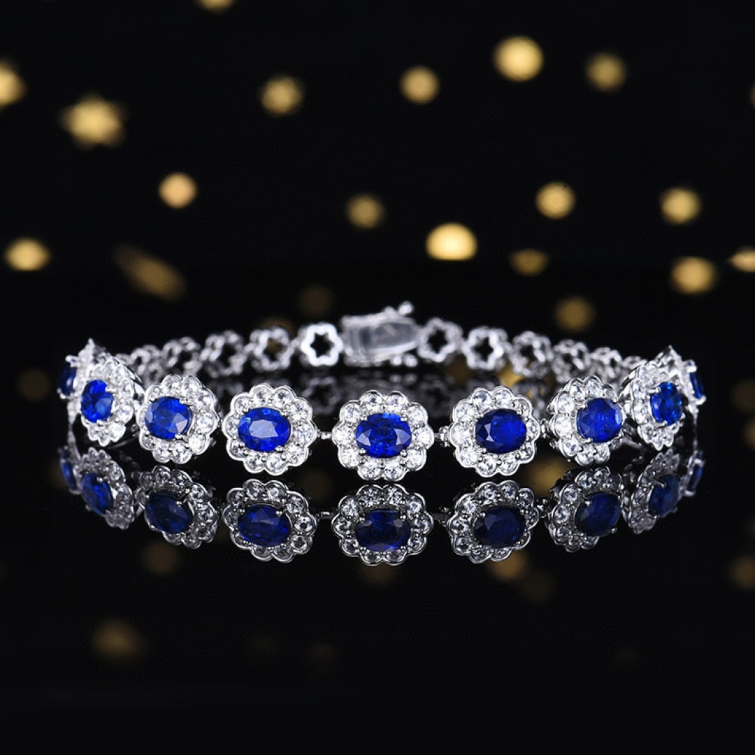 14k Gold 3.89 Ctw Natural Sapphire & Diamond Bracelet: Ref:230979177 // gold content:14k gold // main gemstone:sapphire // shape:oval // carat weight:3. 85ct // color:blue // treatment:natural // cut grade:g // // adjacent gemstone 2 : diamond // number o