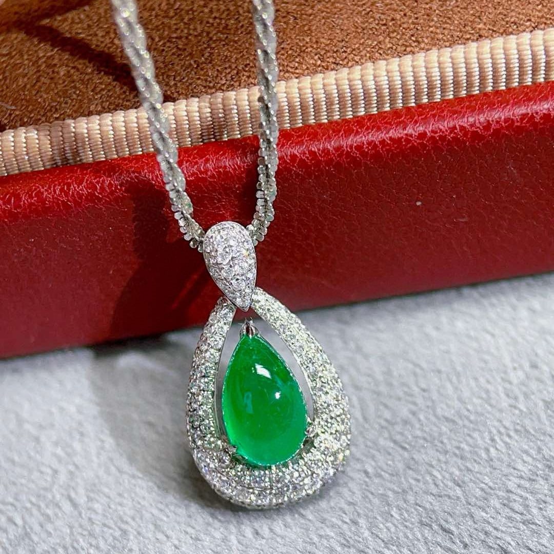 14k Gold 1.82 Ctw Natural Emerald & Diamond Pendant( Without Chain ): Ref:230979188 // gold content:14k gold // main gemstone:emerald // shape:pear // carat weight:1. 36ct // color:green // treatment:natural // cut grade:g // // adjacent gemstone 2 : diamond //