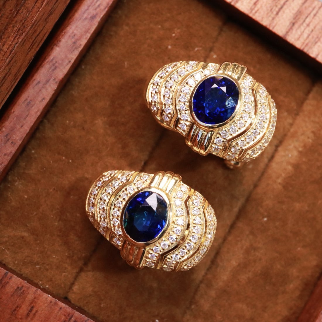 14k Gold 2.29 Ctw Natural Sapphire & Diamond Earrings: Ref:230979191 // gold content:14k gold // main gemstone:sapphire // shape:oval // carat weight:1. 95ct // color:blue // treatment:natural // cut grade:g // // adjacent gemstone 2 : diamond // shape:ro