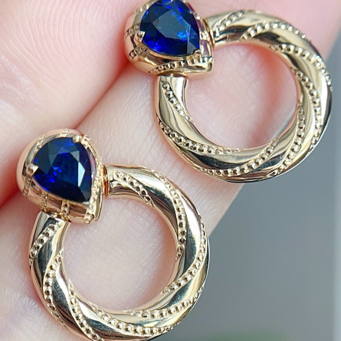 14k Gold 1.3 Ct Natural Sapphire Earrings: Ref:230979212 // gold content:14k gold // main gemstone:sapphire // shape:pear // carat weight:1. 3ct // color:blue // treatment:natural // cut grade:g // Condition: New Low Estimate: 4000 High
