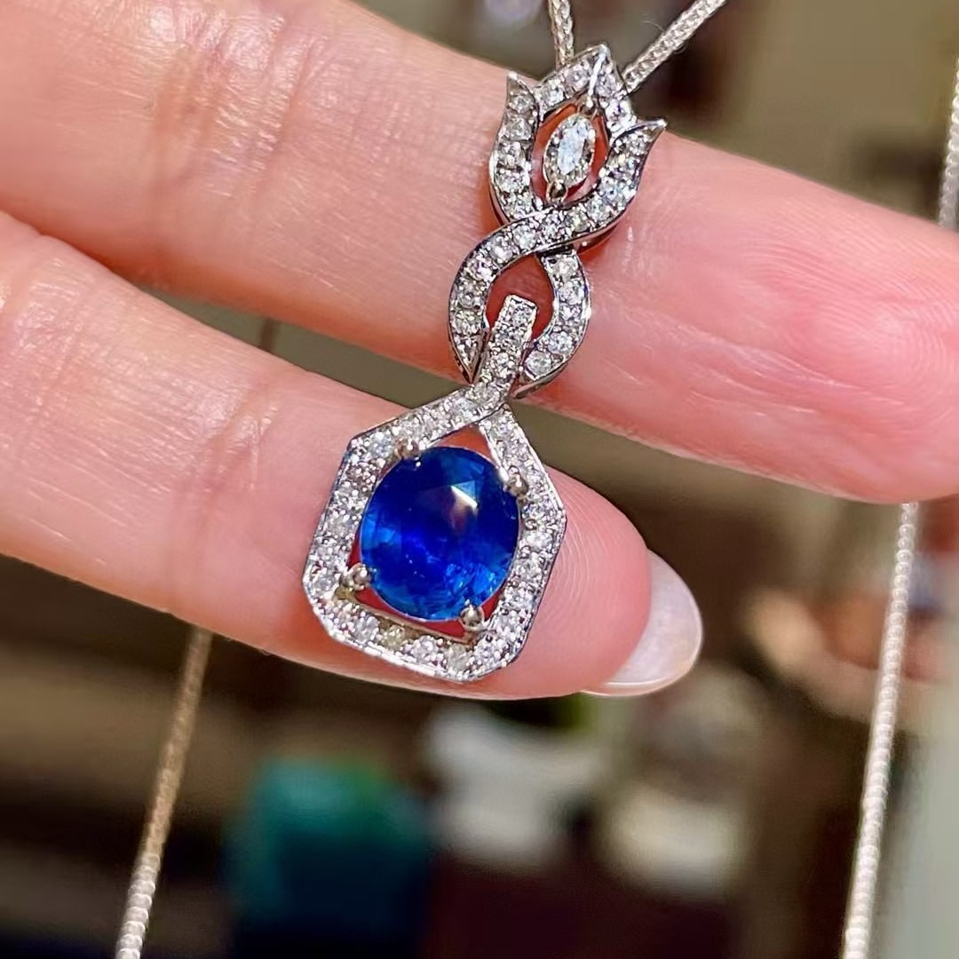14k Gold 2.03 Ctw Natural Sapphire & Diamond Pendant( Without Chain ): Ref:230979231 // gold content:14k gold // main gemstone:sapphire // shape:oval // carat weight:1. 68ct // color:blue // treatment:natural // cut grade:g // // adjacent gemstone 2 : diamond //