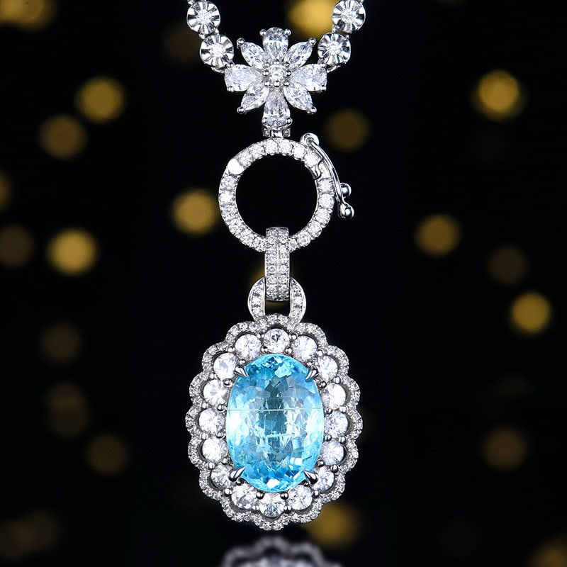 14k Gold 4.07 Ctw Natural Paraiba Tourmaline & Diamond Pendant( Without Chain ): Ref:230980001 // gold content:14k gold // main gemstone:paraiba tourmaline // shape:oval // carat weight:3. 85ct // color:blue // treatment:natural // // adjacent gemstone 2 : diamond // number of